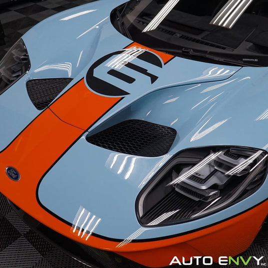 Auto Envy installer applying film to side window