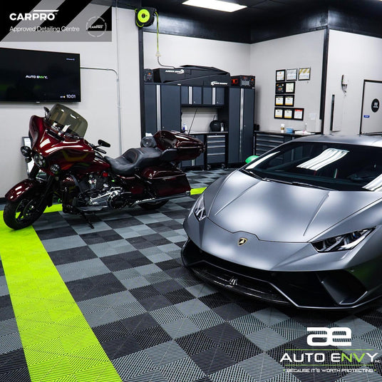 Ceramic film window tinting service on a vehicle near Clovis, CA