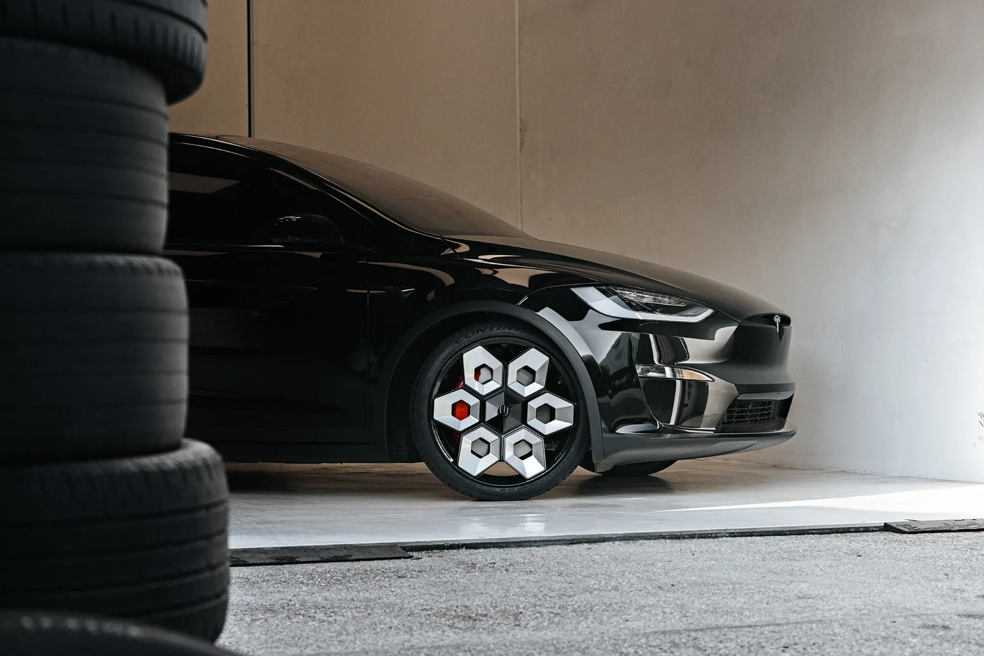 Auto Envy technician applying window tint to car in Clovis, CA